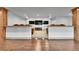 Finished basement with wet bar and entertainment area at 8179 S Kellerman Cir, Aurora, CO 80016