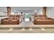 Finished basement with media room and theater seating at 8179 S Kellerman Cir, Aurora, CO 80016