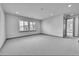 Spacious bedroom featuring neutral walls, plush carpeting, and ample natural light at 8179 S Kellerman Cir, Aurora, CO 80016