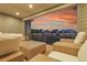 A spacious deck with comfortable seating offers stunning sunset views at 8179 S Kellerman Cir, Aurora, CO 80016