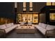 Cozy backyard featuring a modern fire pit, plush outdoor seating, and sleek landscaping at 580 S Franklin St, Denver, CO 80209