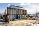 Modern home exterior featuring a striking facade, large windows, and beautiful landscaping at 580 S Franklin St, Denver, CO 80209