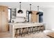 Modern kitchen with light wood cabinets and marble countertops at 580 S Franklin St, Denver, CO 80209