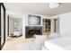 Comfortable living room featuring a sleek fireplace, contemporary decor, and bright ambient lighting at 580 S Franklin St, Denver, CO 80209