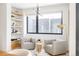 Bright reading room features built-in shelves and comfortable seating at 580 S Franklin St, Denver, CO 80209