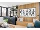 Modern wet bar with black cabinetry and metal shelving at 580 S Franklin St, Denver, CO 80209