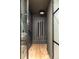Sleek wine cellar with floor-to-ceiling metal racking at 580 S Franklin St, Denver, CO 80209