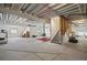 Unfinished basement with high ceilings and natural light offers potential for customization and expansion at 8751 S Wenatchee Ct, Aurora, CO 80016
