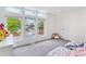 Bright bedroom with a plush carpet, big windows, and a view of the neighborhood at 2280 W 42Nd Ave, Denver, CO 80211