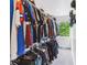 Spacious walk-in closet with shelving for shoes and hanging storage for shirts and pants at 2280 W 42Nd Ave, Denver, CO 80211