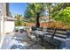 Outdoor dining and lounge area with a table, chairs, and patio furniture at 8762 Mourning Dove Ln, Highlands Ranch, CO 80126