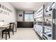 Comfortable bedroom with a bunk bed, a study desk and bright natural light at 8762 Mourning Dove Ln, Highlands Ranch, CO 80126
