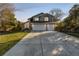 Charming two-story home with a large driveway and an attached two-car garage at 8762 Mourning Dove Ln, Highlands Ranch, CO 80126