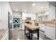Modern kitchen featuring granite countertops, stainless steel appliances, and a functional center island at 8762 Mourning Dove Ln, Highlands Ranch, CO 80126