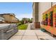 Beautiful backyard with lawn, hot tub, patio, planted wall with flowering plants, and nice landscaping at 9636 Bennett Peak St, Littleton, CO 80125