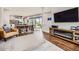 Open-concept living space showcasing a spacious layout with the living room, dining area, and kitchen at 9636 Bennett Peak St, Littleton, CO 80125