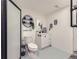 Chic powder room featuring modern fixtures, vanity with storage, and a sleek, glass-enclosed shower at 5550 E 130Th Dr, Thornton, CO 80241