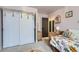 Cozy bedroom features unique decor and closet space at 5550 E 130Th Dr, Thornton, CO 80241