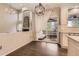 Charming dining area with access to an outdoor deck and views of the living area at 5660 E Burlington Dr, Castle Rock, CO 80104