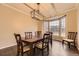 Inviting dining room featuring a bay window and classic chandelier at 5660 E Burlington Dr, Castle Rock, CO 80104