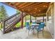 Outdoor patio area with seating, grill, and string lights perfect for entertaining at 5660 E Burlington Dr, Castle Rock, CO 80104