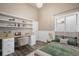 Cozy bedroom with built in desk shelves, perfect for a home office or study area at 2371 Pelican Bay Dr, Monument, CO 80132