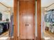 Spacious walk-in closet with custom shelving and storage for organized wardrobe solutions at 3395 Timbergate Trl, Evergreen, CO 80439