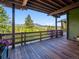 Expansive deck providing unobstructed views of a beautiful mountain landscape at 3395 Timbergate Trl, Evergreen, CO 80439