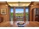 Dining area with stunning mountain views, and access to the deck at 3395 Timbergate Trl, Evergreen, CO 80439