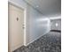 Apartment building hallway with carpeted floors at 720 S Clinton St # 9D, Denver, CO 80247