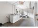 Functional laundry room equipped with multiple washing machines, dryers, and a utility sink at 2100 N Franklin St # 5, Denver, CO 80205