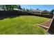 Large backyard with grassy area and privacy fence at 2998 S York St, Denver, CO 80210