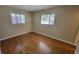 Bright bedroom with hardwood floors and ample closet space at 2998 S York St, Denver, CO 80210