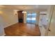 Spacious dining area with hardwood floors and brick fireplace at 2998 S York St, Denver, CO 80210