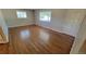 Bright living room featuring hardwood floors and large windows at 2998 S York St, Denver, CO 80210