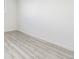 Simple bedroom with gray vinyl flooring and neutral walls at 2538 S Dover Way, Lakewood, CO 80227