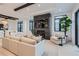 Modern living room with a large sofa and a contemporary fireplace at 521 Milwaukee St, Denver, CO 80206