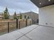 Covered patio with concrete flooring and modern railing at 521 Milwaukee St, Denver, CO 80206