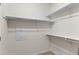 Walk-in closet with built-in shelving, offering ample storage space at 4100 Albion St # 614, Denver, CO 80216