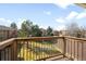 Balcony view overlooking green space and other residential buildings under a blue sky at 3041 S Ursula Cir # 302, Aurora, CO 80014