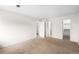 A bedroom with neutral carpeting that offers multiple doorways and abundant natural light at 3041 S Ursula Cir # 302, Aurora, CO 80014