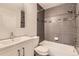 Renovated bathroom featuring modern tiling and updated fixtures at 8243 S Fillmore Cir, Centennial, CO 80122