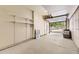 Attached one-car garage with overhead lighting and storage shelving, ready for your vehicles and belongings at 8243 S Fillmore Cir, Centennial, CO 80122