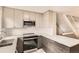 Contemporary kitchen featuring sleek countertops, stainless steel appliances, and modern cabinetry at 8243 S Fillmore Cir, Centennial, CO 80122