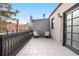 Outdoor balcony with skyline views, decorative iron fencing, and patio furniture perfect for relaxation at 624 E 18Th Ave # 4, Denver, CO 80203