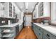 Galley kitchen features shaker cabinets, quartz counters, stainless steel appliances at 624 E 18Th Ave # 4, Denver, CO 80203