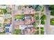 Overhead view showcasing the layout of the house, surrounding streets, and landscaped neighborhood at 1418 Glencoe St, Denver, CO 80220