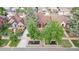Beautiful home featuring mature trees, manicured lawn and welcoming entryway at 1418 Glencoe St, Denver, CO 80220