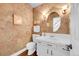 Charming powder room with unique wallpaper, hardwood floors, and a white vanity at 1583 Sunset Ridge Rd, Highlands Ranch, CO 80126