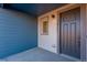 Close up of the exterior door featuring modern design and gray accents and visible unit number at 16777 W 94Th Way, Arvada, CO 80007